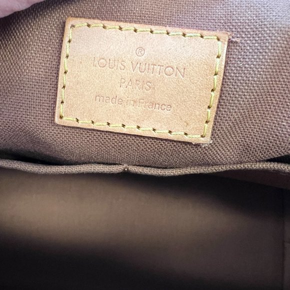 This Louis Vuitton Tivoli PM - Picture 9 of 10